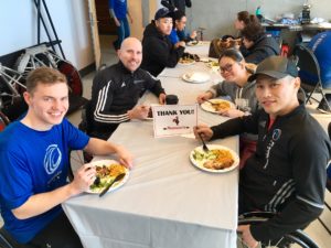 Athletes eating Nando's at the 2018 Vancouver Invitational 