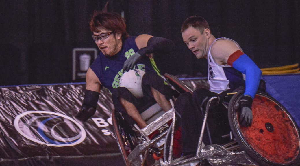 Daisuke Ikezaki gets upended by Fabien Lavoie at the 2017 Vancouver Invitational Wheelchair Rugby Tournament.