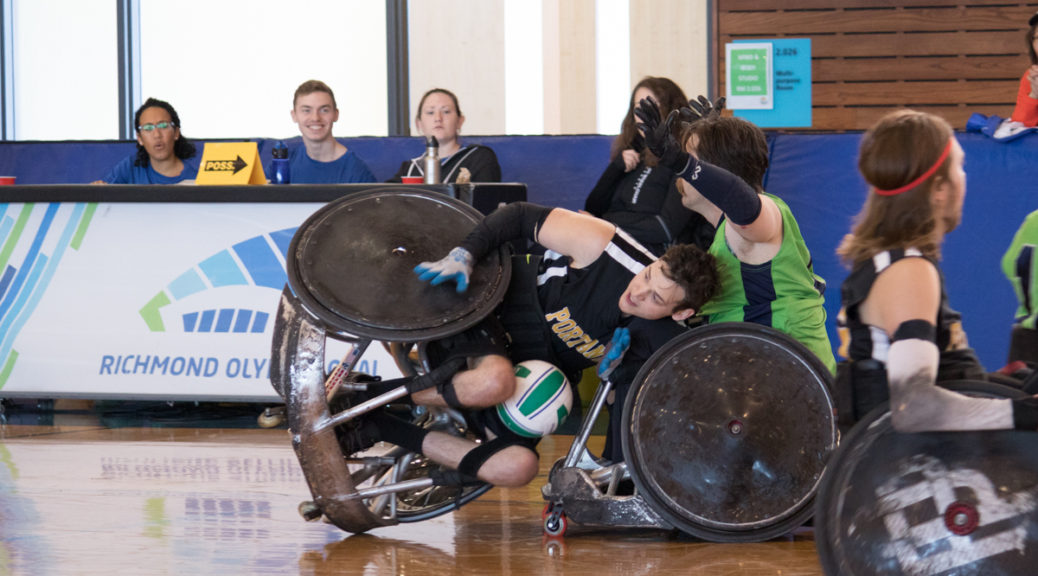 Richard Tooley taking names at the Vancouver Invitational Wheelchair Rugby Tournament