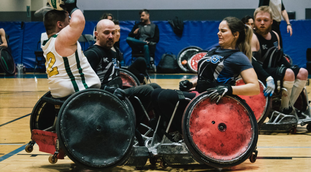 Jessica Kruger hits Justin Beaver at the 2020 Vancouver Invitational Wheelchair Rugby Tournament